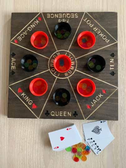 Rummoli wooden board game with removable cups