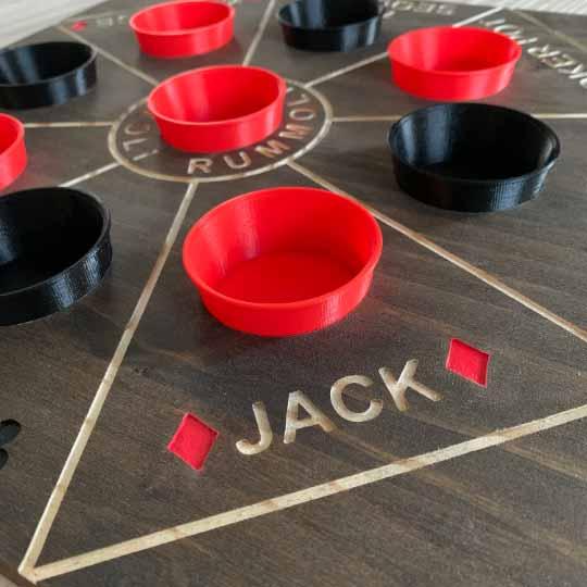 Rummoli wooden board game with removable cups